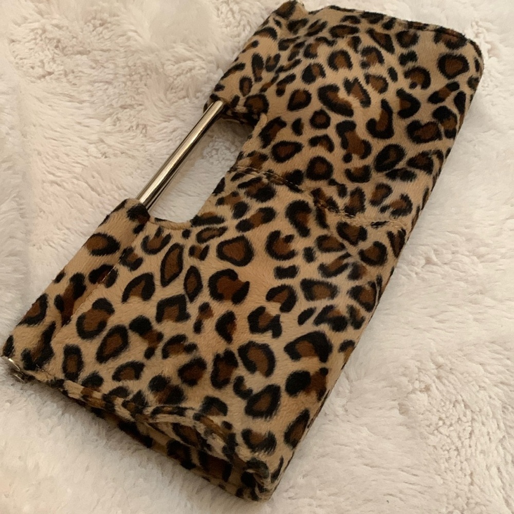 Leopard print clutch handbag